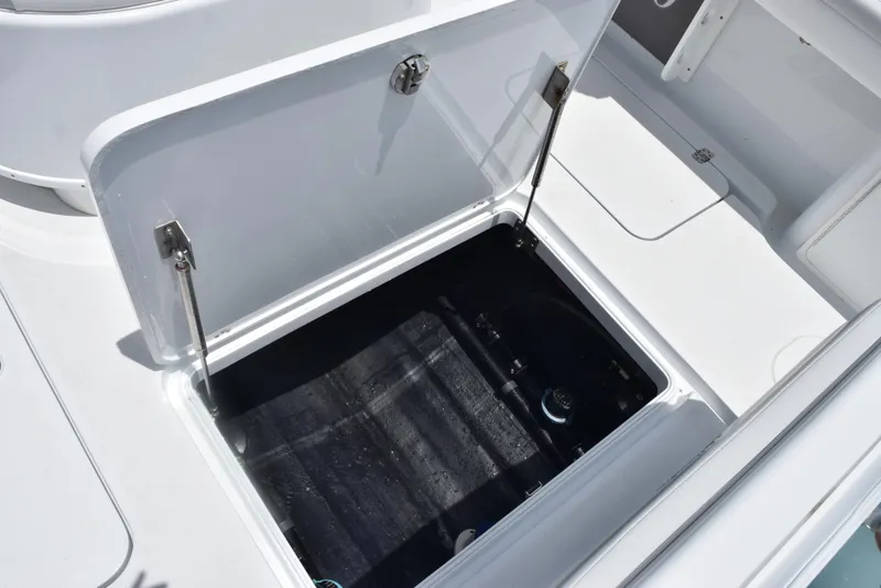 Slide: The Image of 2024 Yellowfin 36 Offshore boat storage compartment with open hatch. - 34