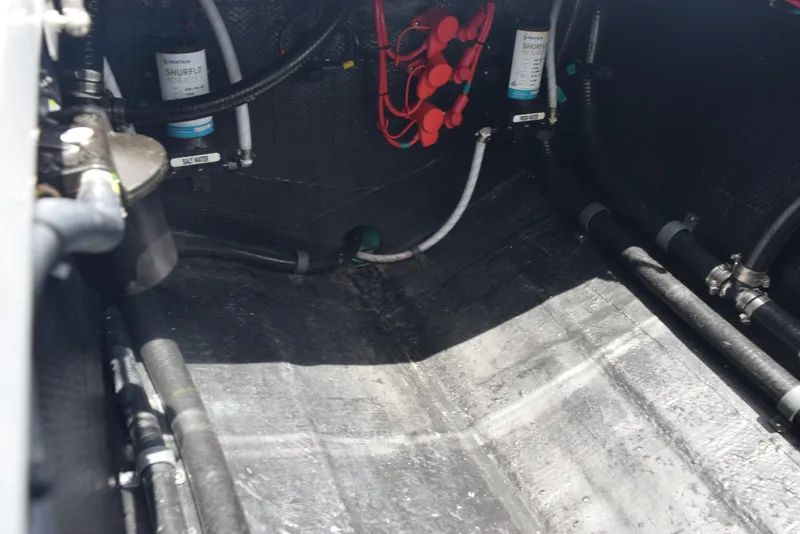 Slide: The Image of 2024 Yellowfin 36 Offshore boat interior with visible wiring and components. - 35