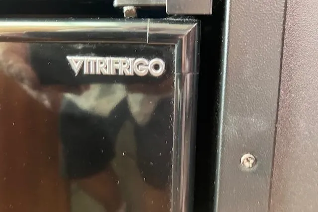 Slide: The Image of Vitrifrigo refrigerator on 2005 Back Cove Downeast Hardtop boat, close-up view. - 13