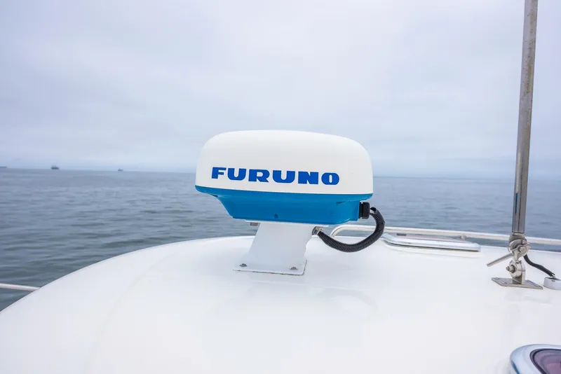 Slide: The Image of Furuno radar on 2005 Back Cove Downeast Hardtop boat, ocean background. - 36