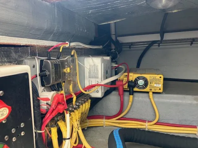 Slide: The Image of Electrical wiring and components inside a 2005 Back Cove Downeast Hardtop boat. - 40