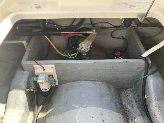 Slide: The Image of 2005 Back Cove Downeast Hardtop engine compartment with visible wiring and components. - 45