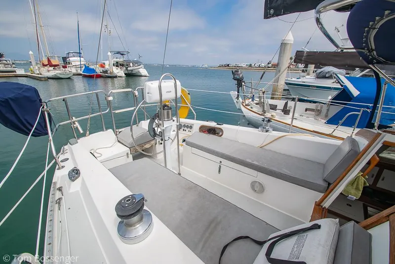 Slide: The Image of Cockpit of a 1992 Catalina 36 sailboat docked at a marina. - 26