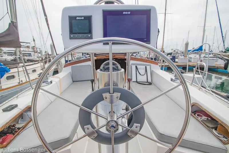 Slide: The Image of Steering wheel and navigation system on a 1992 Catalina 36 sailboat in a marina. - 28