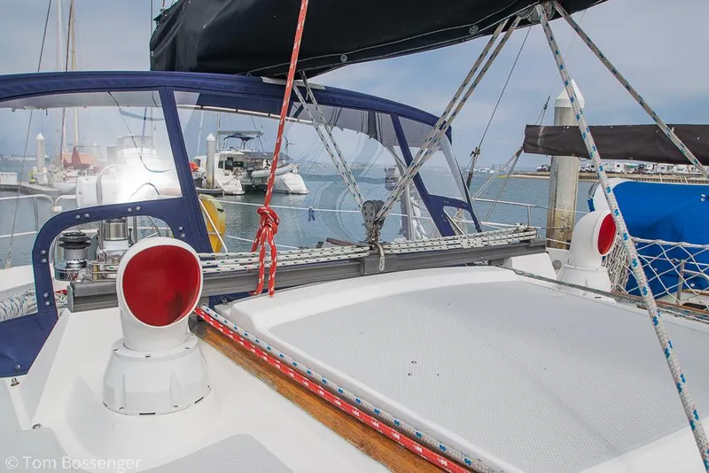 Slide: The Image of Sailboat deck view, Catalina 36, 1992 model, docked in a marina with other boats. - 39