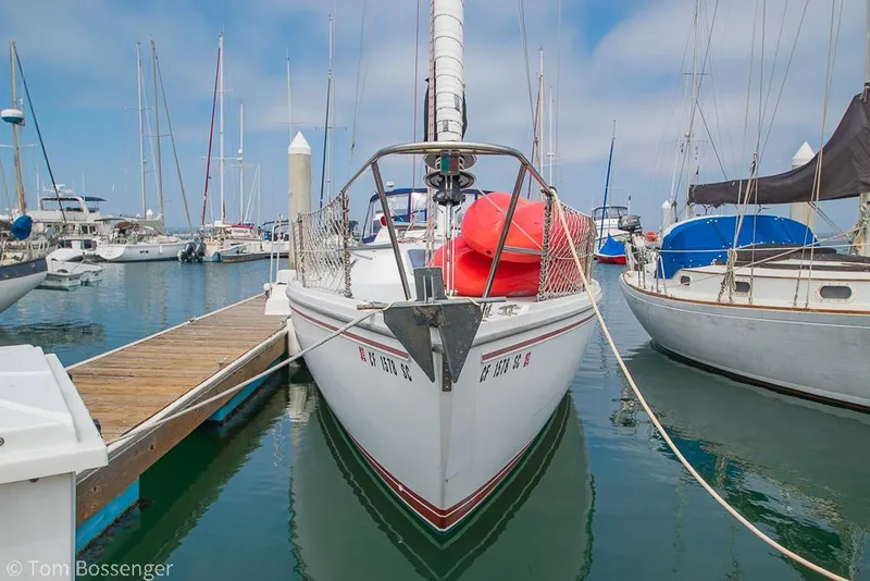 Slide: The Image of Catalina 36 sailboat docked in marina, 1992 model, with clear blue sky. - 4