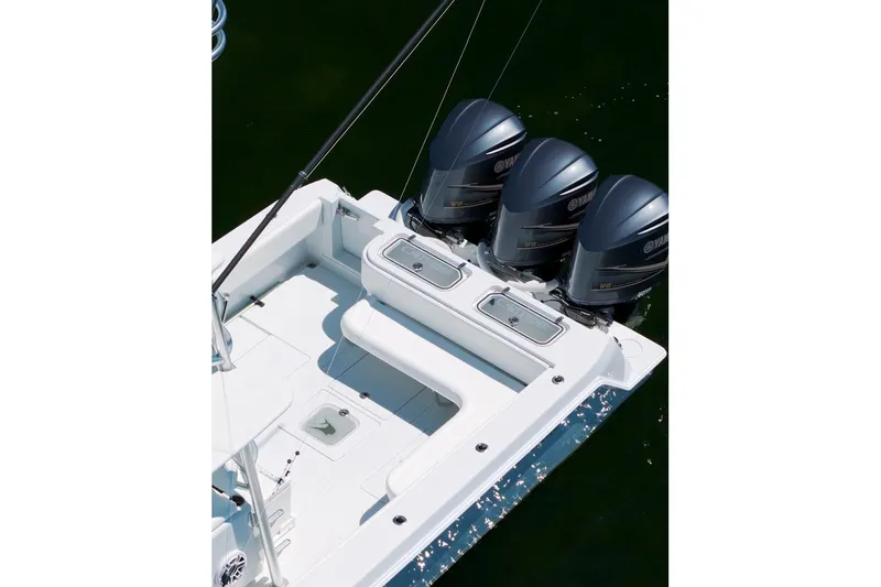 Slide: The Image of 2018 Contender 39 ST boat with triple Yamaha outboard engines, aerial view. - 10
