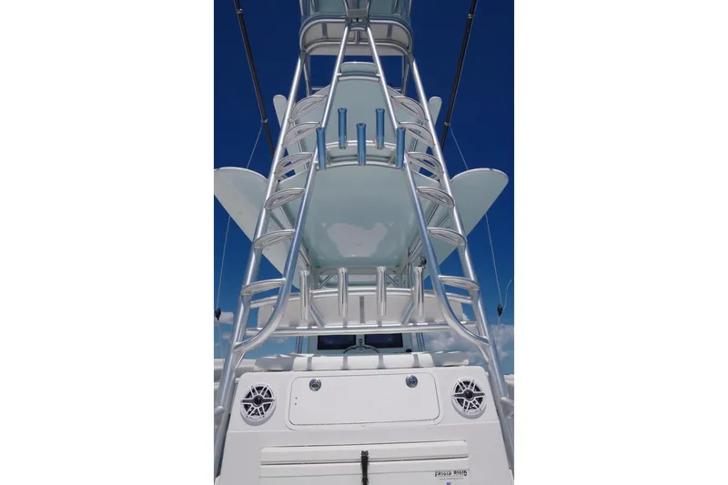 Slide: The Image of 2018 Contender 39 ST boat tower with ladder against clear blue sky. - 8