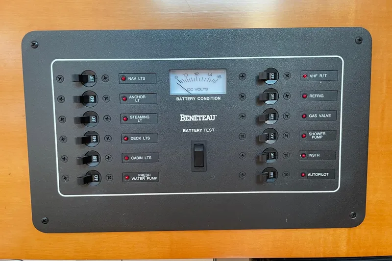Slide: The Image of Control panel of a 1996 Beneteau First 36s7 sailboat with various switches and battery gauge. - 21