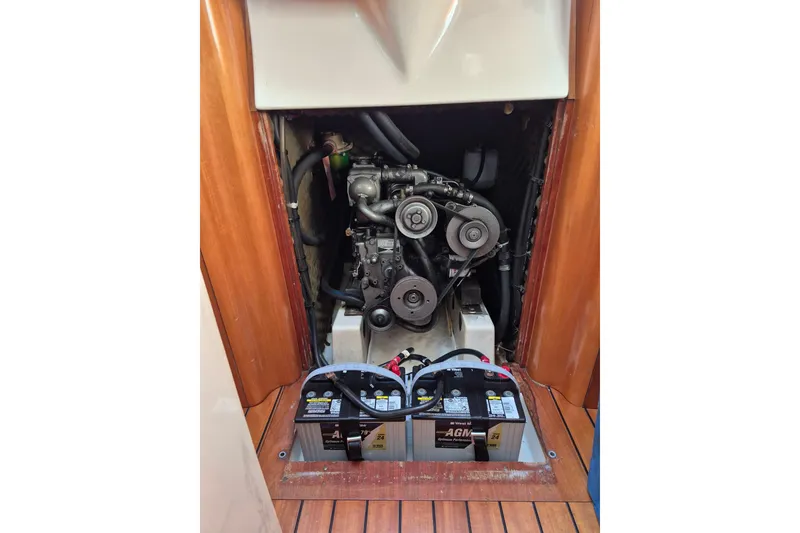 Slide: The Image of Engine compartment of a 1996 Beneteau First 36s7 sailboat with visible batteries. - 33