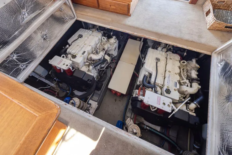 Slide: The Image of Engine compartment of 1993 Tollycraft 40 Sport Sedan with dual engines. - 37