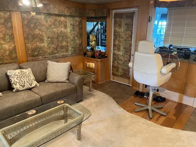 Slide: The Image of Luxurious 2001 Stardust Cruisers houseboat interior with cozy seating and elegant decor. - 44