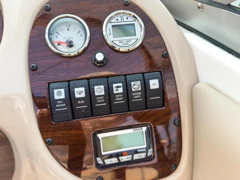 Slide: The Image of Dashboard of 2007 Chaparral 190 SSi boat with gauges and control switches. - 16