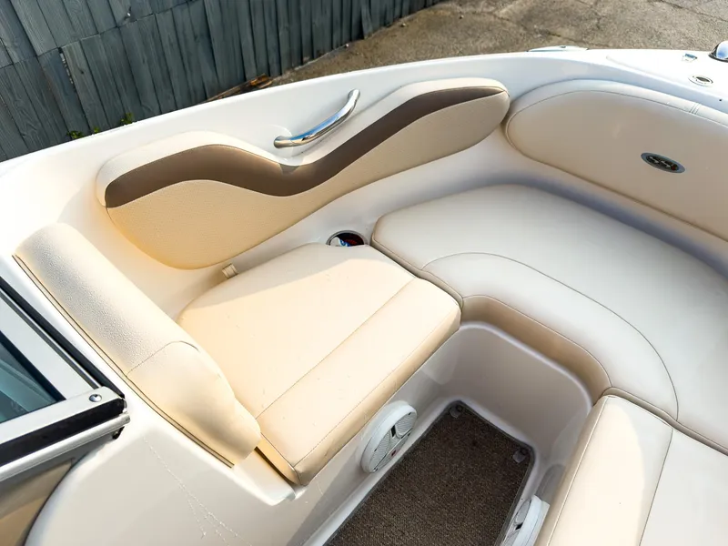 Slide: The Image of 2007 Chaparral 190 SSi boat interior with beige seating and sleek design. - 25