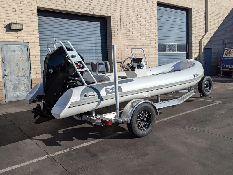 Slide: The Image of Overhead view of 2025 Tide Craft Kodiak 16 boat on concrete surface. - 7