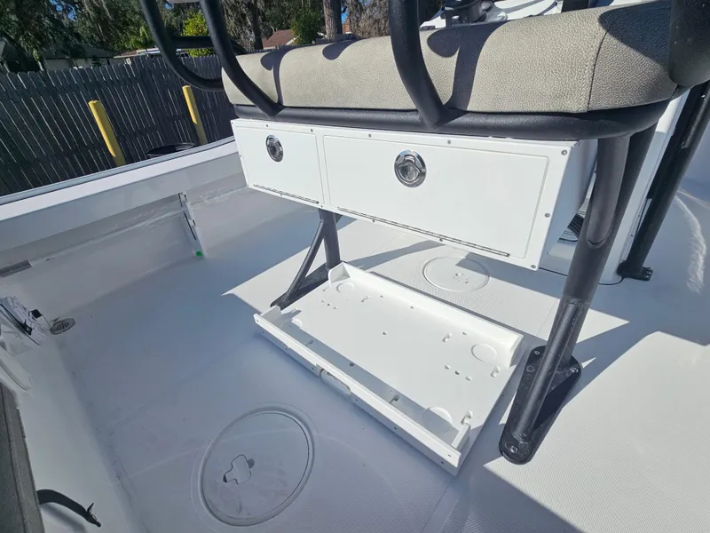 Slide: The Image of 2026 Sea Hunt BX 22 BR boat interior with storage compartments and seating. - 17