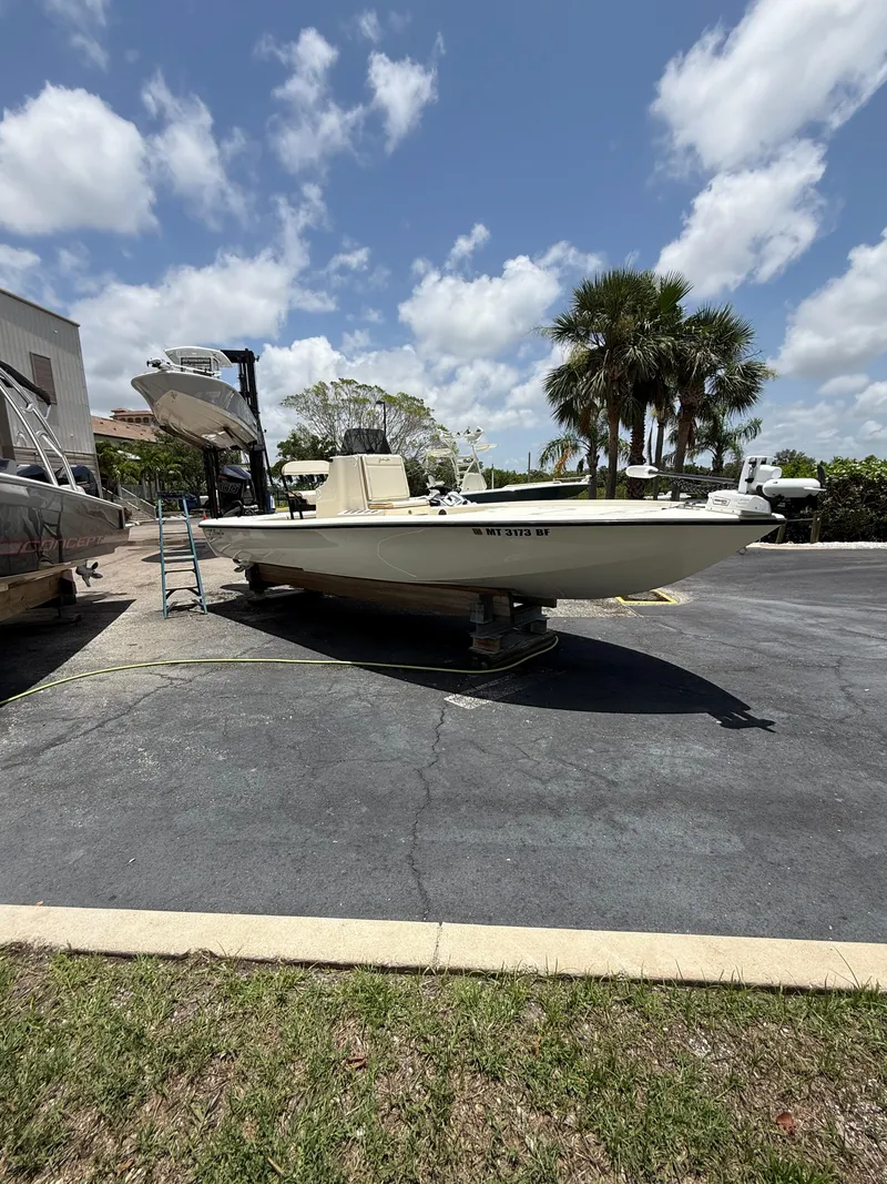The Image of 2017 Yellowfin 24 Bay CE boat on display under a sunny sky. - 0