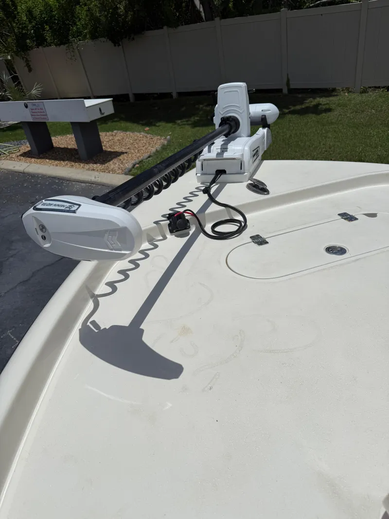 Slide: The Image of 2017 Yellowfin 24 Bay CE boat with trolling motor on deck. - 11