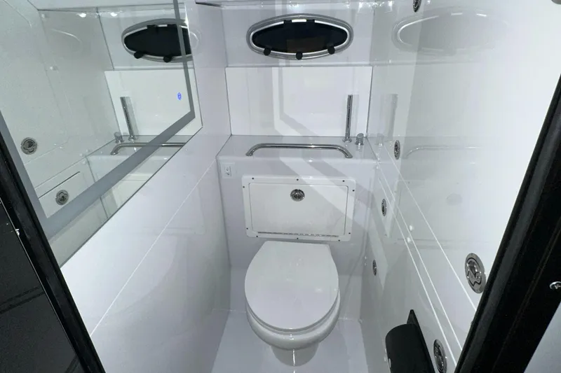 Slide: The Image of 2023 Life Proof 35 Full Cabin boat bathroom with modern fixtures and sleek design. - 13
