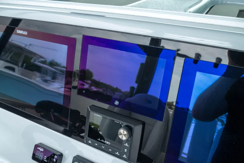 Slide: The Image of Dashboard of 2026 Crevalle 33 CSF boat with advanced navigation displays. - 37