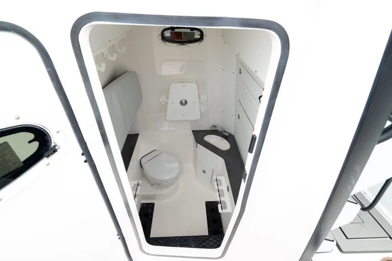 Slide: The Image of Interior view of 2026 Crevalle 33 CSF boat bathroom with modern amenities. - 4