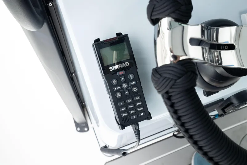 Slide: The Image of Simrad marine radio on Crevalle 33 CSF boat dashboard, 2026 model. - 46