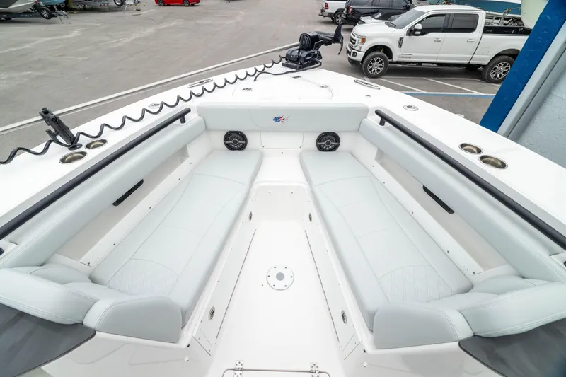 Slide: The Image of 2026 Crevalle 33 CSF boat interior with white seating and modern design. - 5