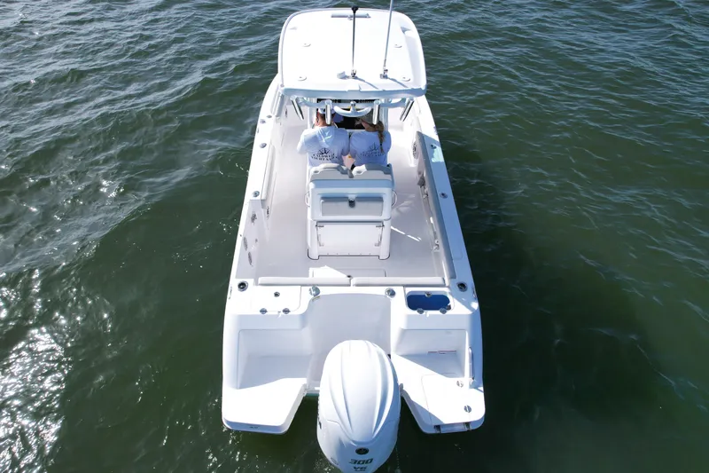 Slide: The Image of 2022 Everglades 235 Center Console boat on open water, aerial view. - 8