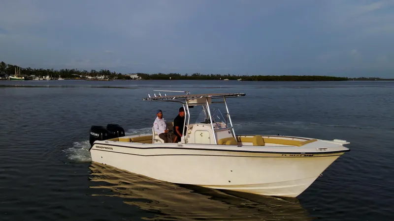 The Image of Grady-White 273 Chase CC boat cruising on calm waters, 2025 model. - 0