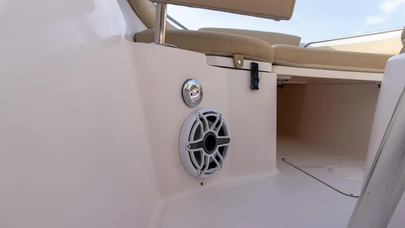 Slide: The Image of Grady-White 273 Chase CC 2025 boat interior with speaker and seating. - 11