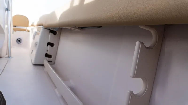 Slide: The Image of Interior view of Grady-White 273 Chase CC 2025 boat, featuring seating and storage. - 15