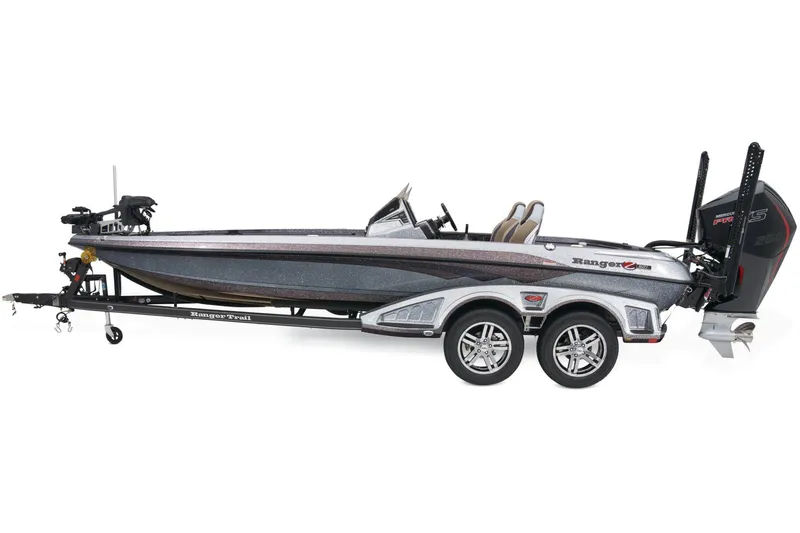 Slide: The Image of 2025 Ranger Z521R boat displayed indoors on a trailer. - 8