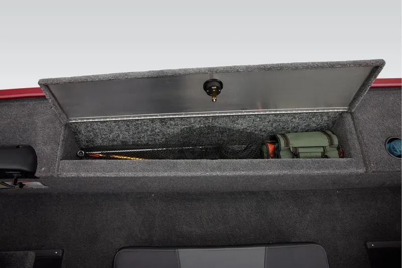 Slide: The Image of 2025 Tracker Panfish 17 boat interior with open storage compartment and seating. - 18