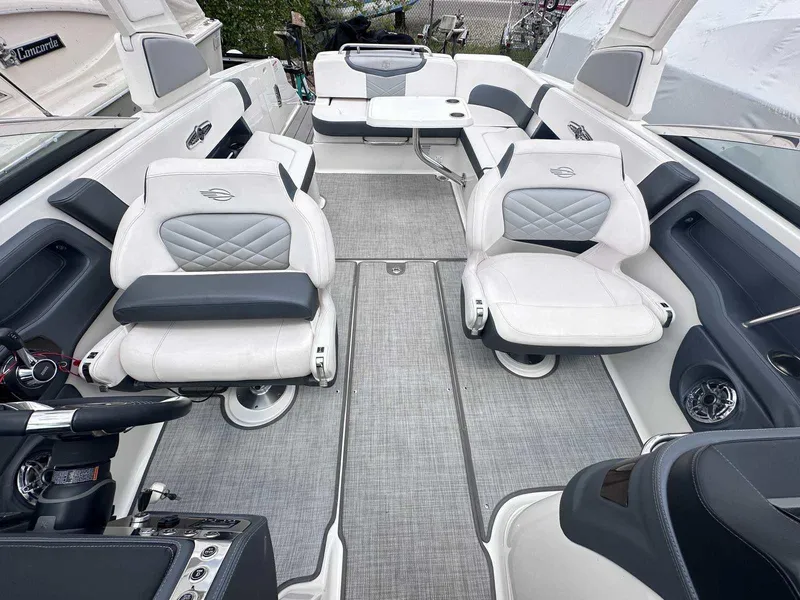 Slide: The Image of 2021 Chaparral 30 Surf boat interior with luxurious seating and modern design. - 12