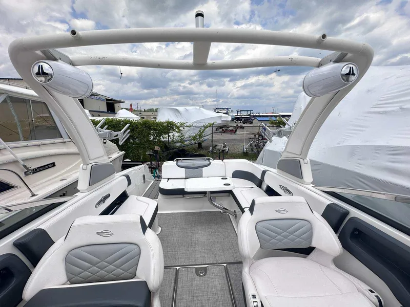 Slide: The Image of 2021 Chaparral 30 Surf boat interior with luxurious seating and modern design. - 13