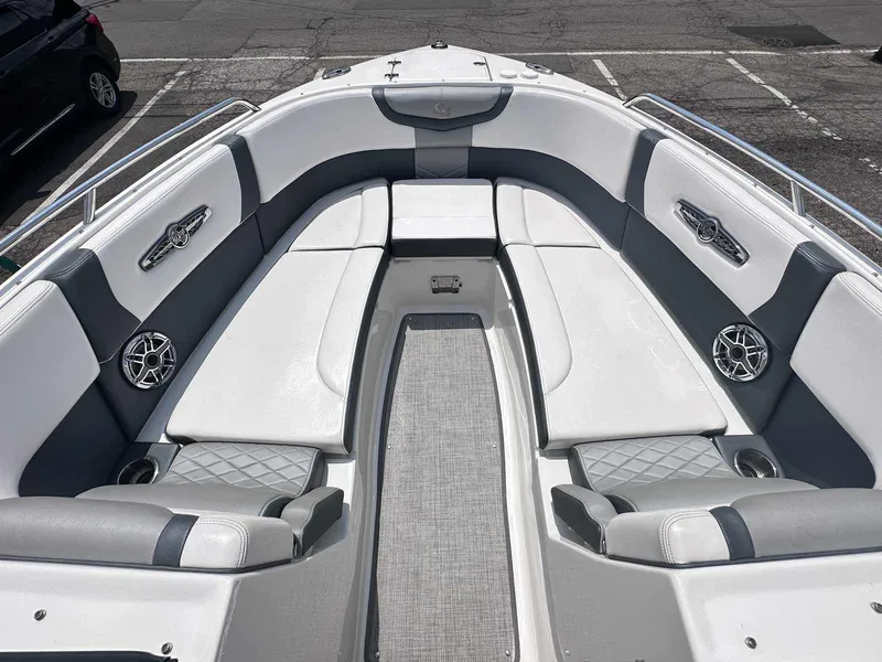 Slide: The Image of 2021 Chaparral 30 Surf boat interior with spacious seating and modern design. - 33