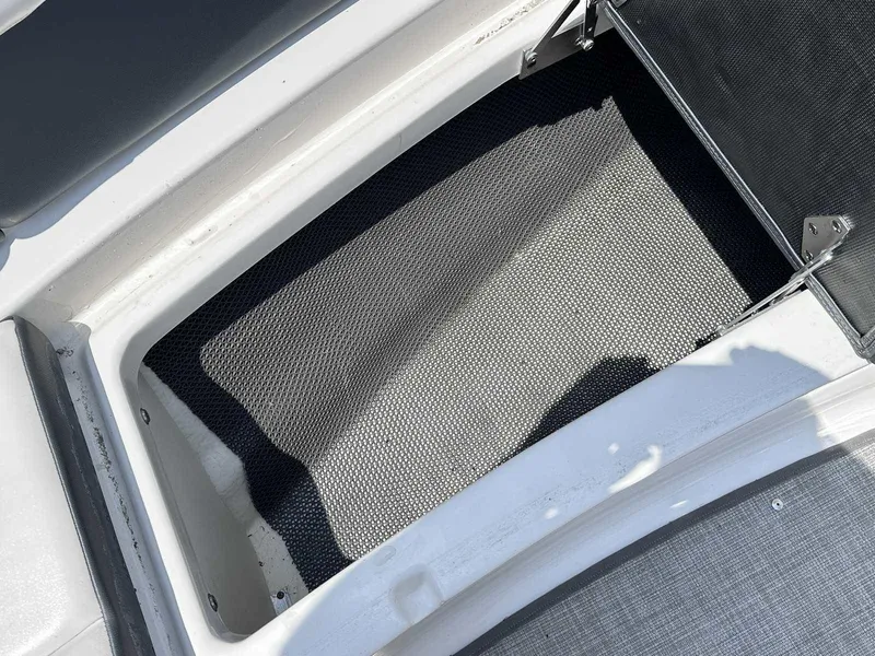 Slide: The Image of Storage compartment of 2021 Chaparral 30 Surf boat, featuring a spacious interior. - 39