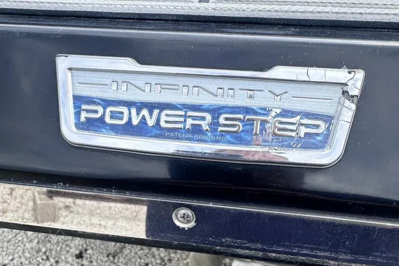 Slide: The Image of Infinity Power Step badge on 2021 Chaparral 30 Surf boat. - 7