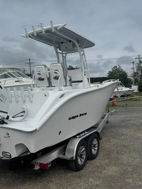 The Image of 2025 Cape Horn 22 OS boat on trailer, featuring sleek design and modern amenities. - 10