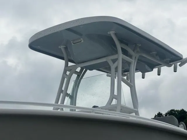 Slide: The Image of 2025 Cape Horn 22 OS boat with T-top against cloudy sky. - 19