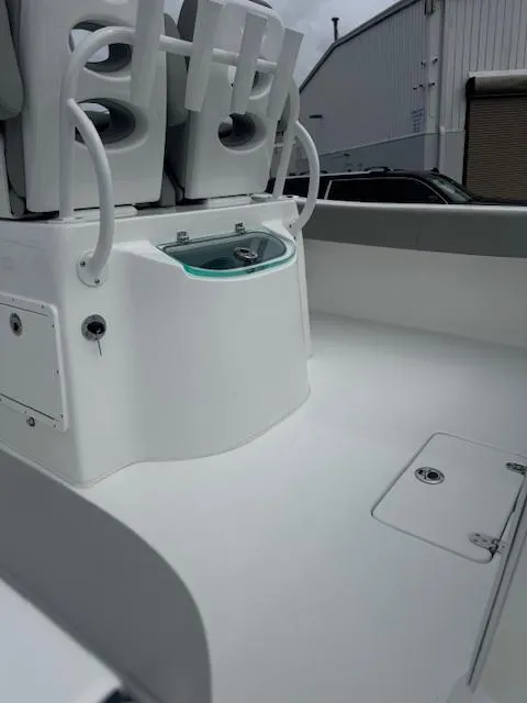 Slide: The Image of 2025 Cape Horn 22 OS boat interior with seating and storage compartments. - 13