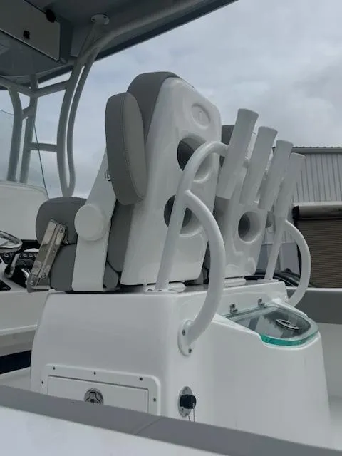 Slide: The Image of 2025 Cape Horn 22 OS boat seating with rod holders and modern design. - 17