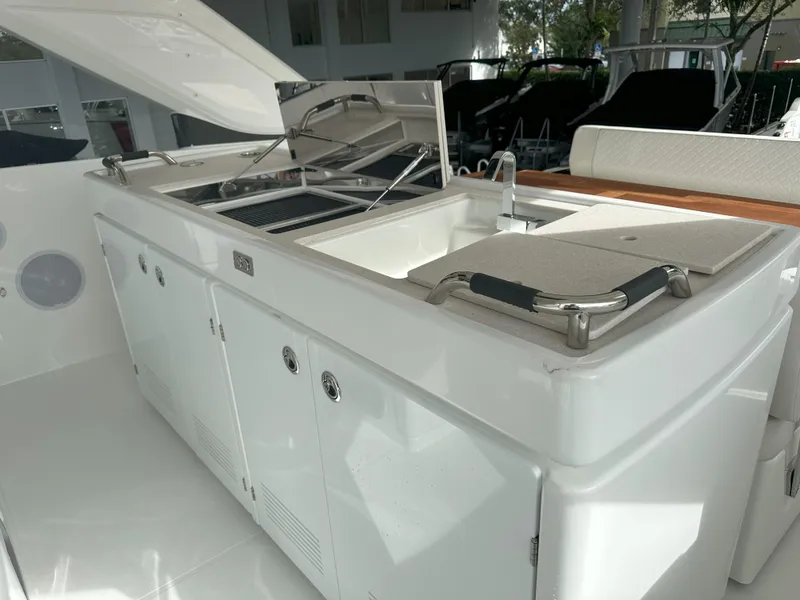 Slide: The Image of Outdoor kitchen on 2024 Jeanneau DB 43 yacht with sink and storage. - 18