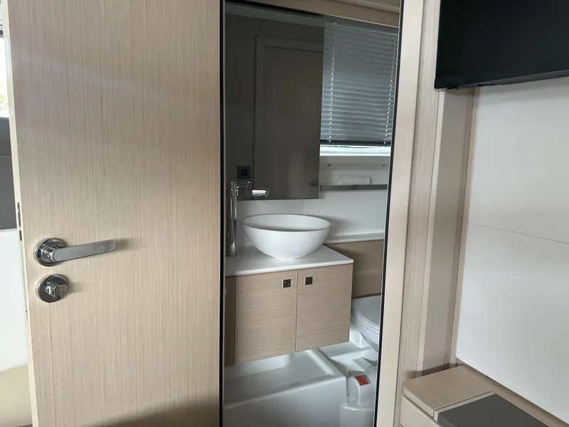 Slide: The Image of 2024 Jeanneau DB 43 yacht bathroom with modern sink and sleek design. - 32