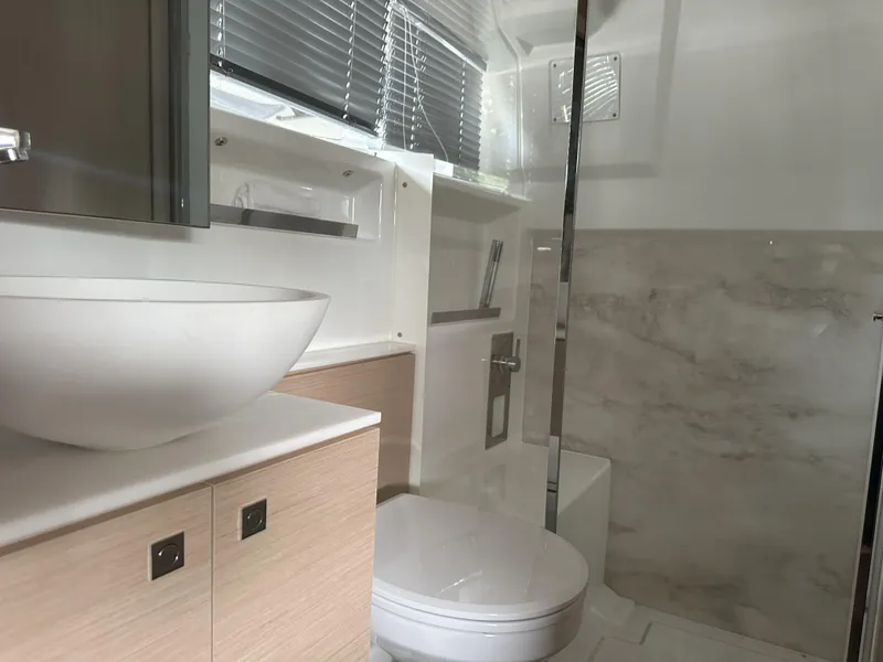 Slide: The Image of Modern bathroom in 2024 Jeanneau DB 43 yacht with sleek fixtures and elegant design. - 34