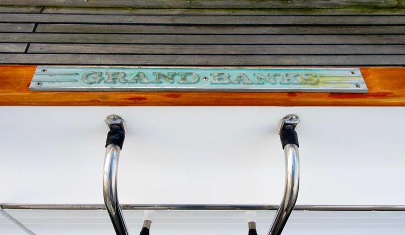 Slide: The Image of Grand Banks 42 Classic yacht nameplate and railing, 2000 model. - 13