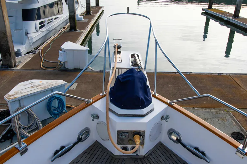 Slide: The Image of Bow view of 2000 Grand Banks 42 Classic yacht docked at marina. - 17