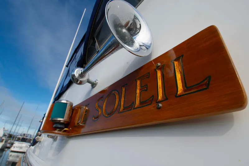 Slide: The Image of Grand Banks 42 Classic yacht, 2000 model, with "Le Soleil" nameplate and horn. - 18