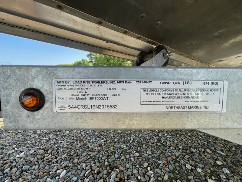 Slide: The Image of Label on Load Rite trailer, model 16F1200WT, with manufacturing details and specifications. - 17
