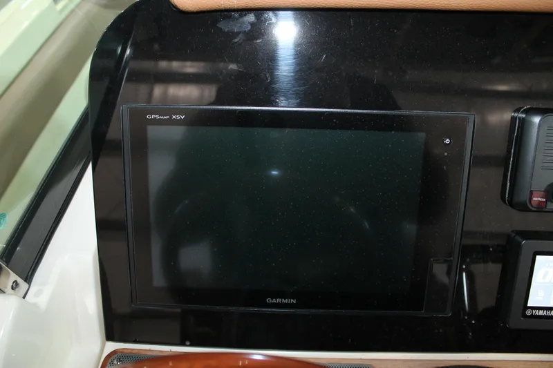 Slide: The Image of Garmin GPS display on 2018 Chris-Craft Catalina 26 boat dashboard. - 16